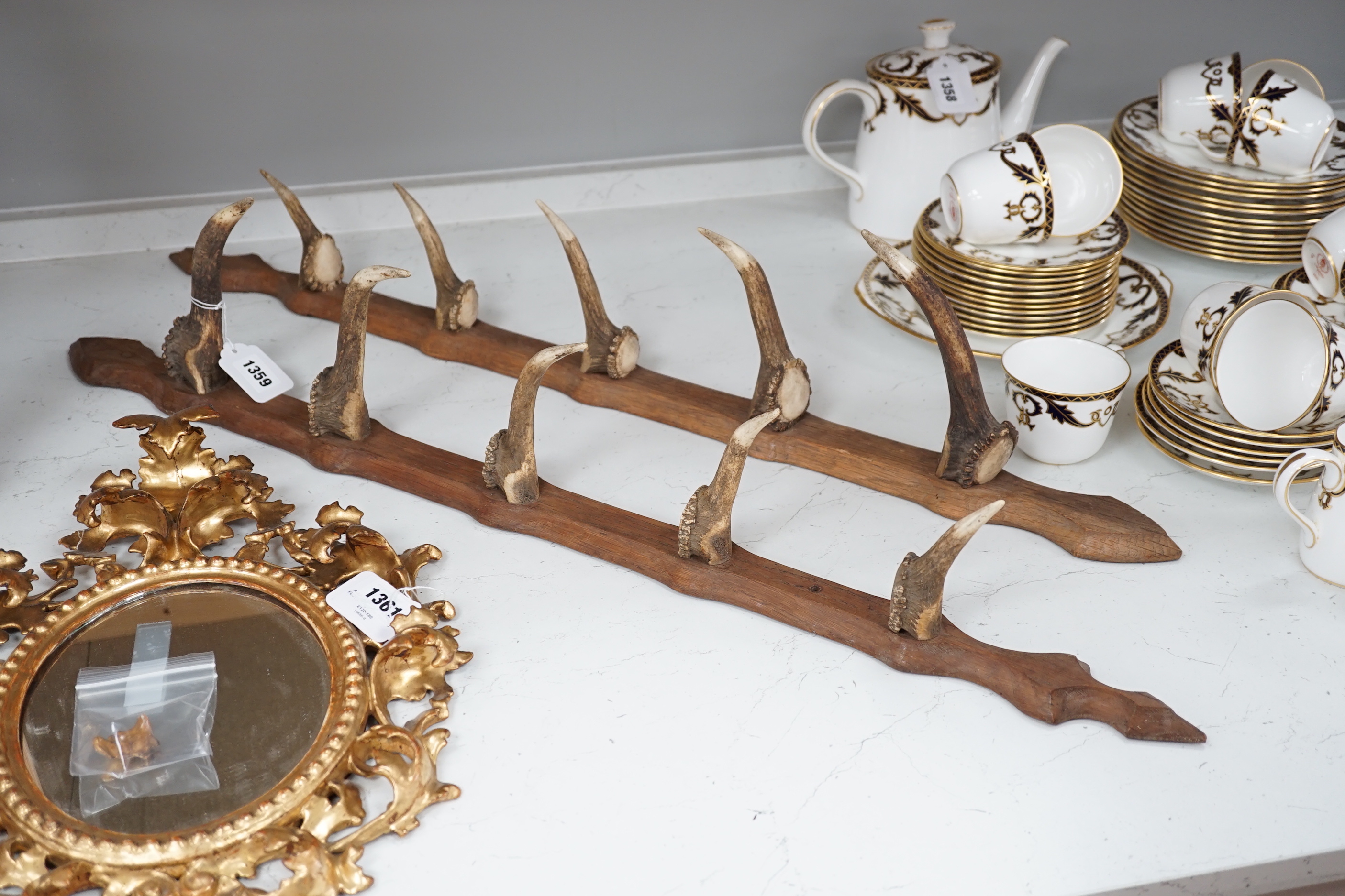 A two piece antler gun rack, 87cm high